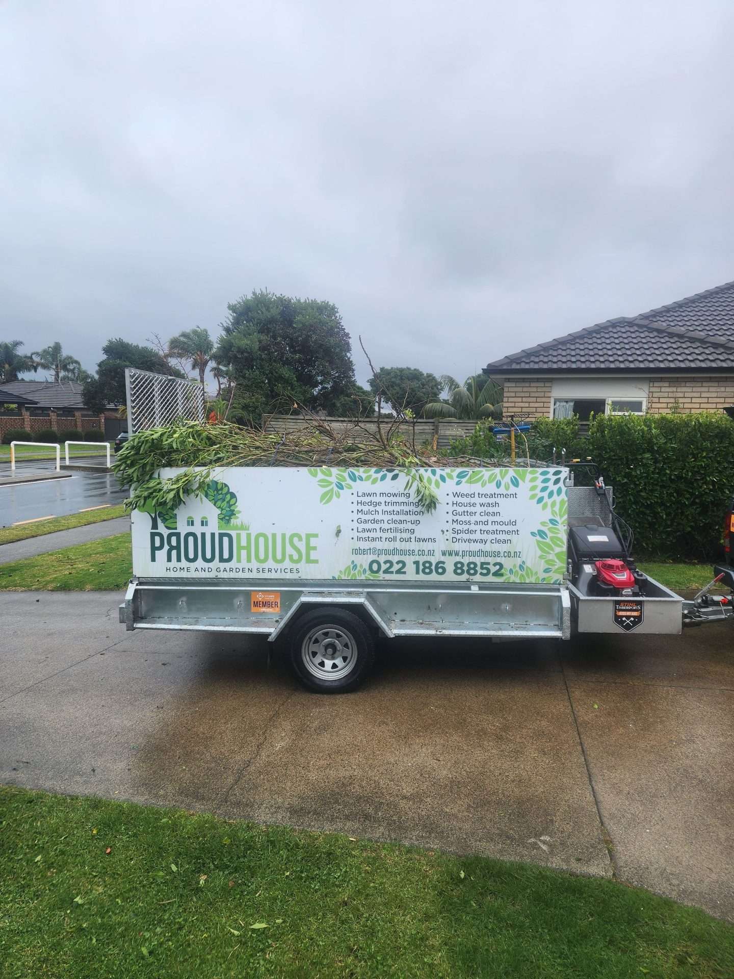 proudhouse work trailer loaded with organic clippings